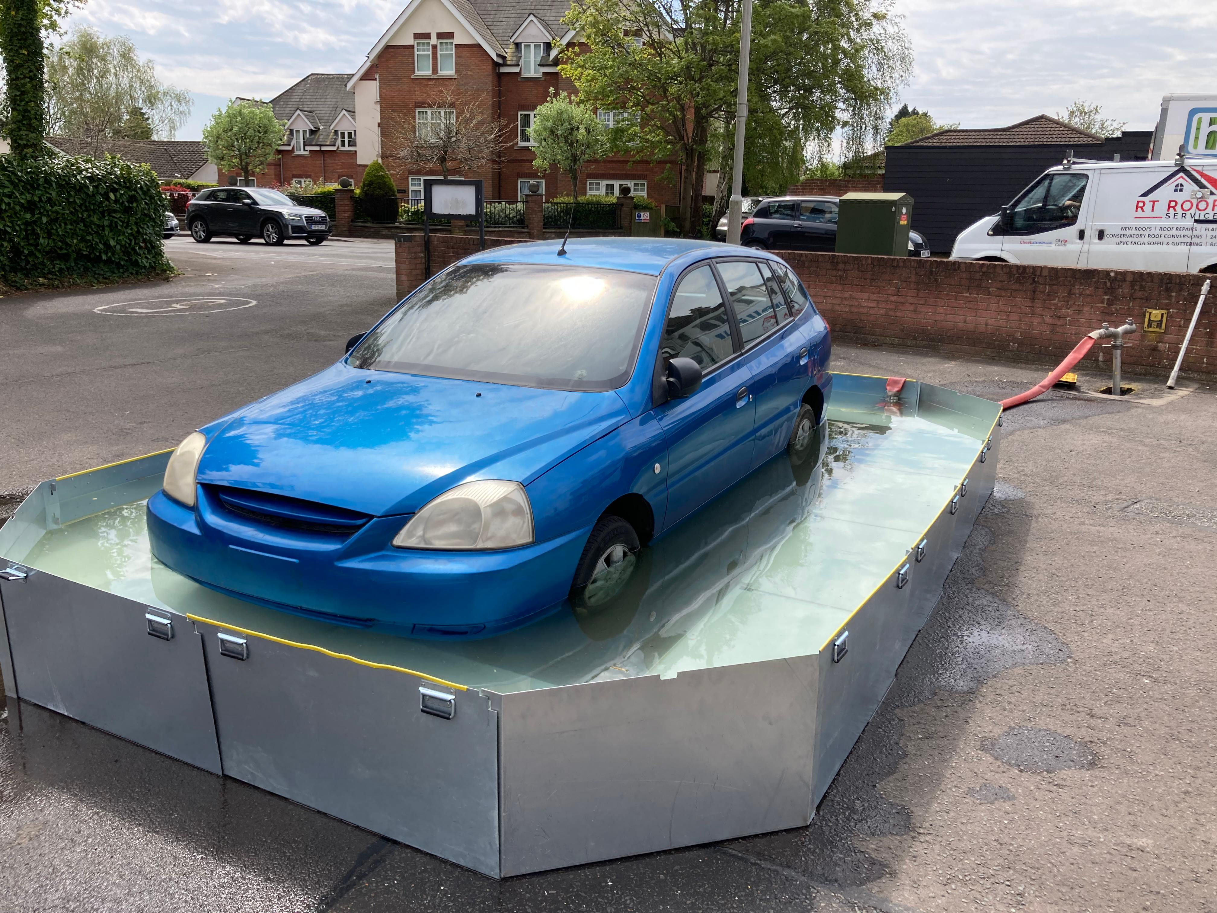 Quarantine fence heavy flooded car-1