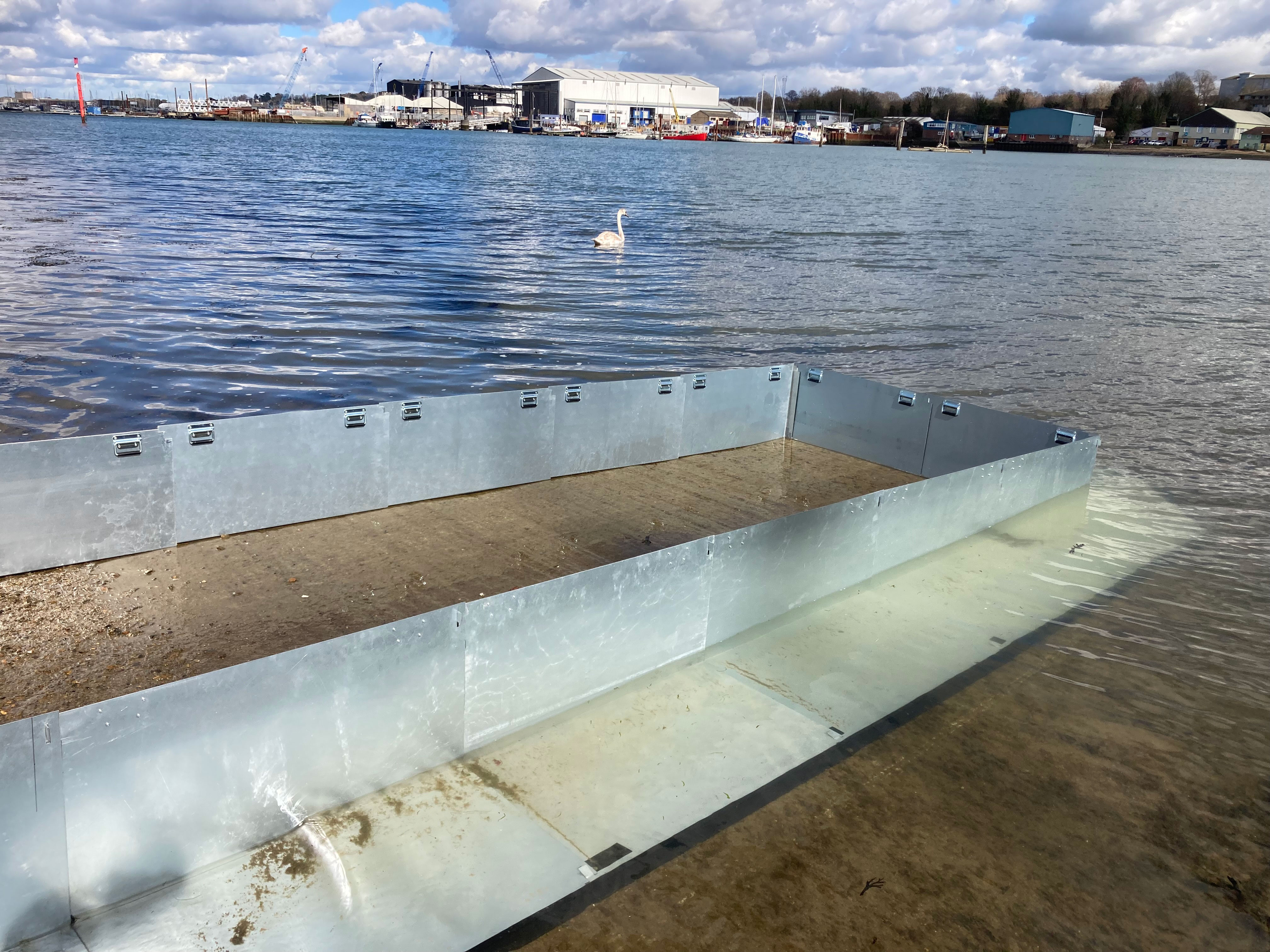 floodfence-heavy-divert-river